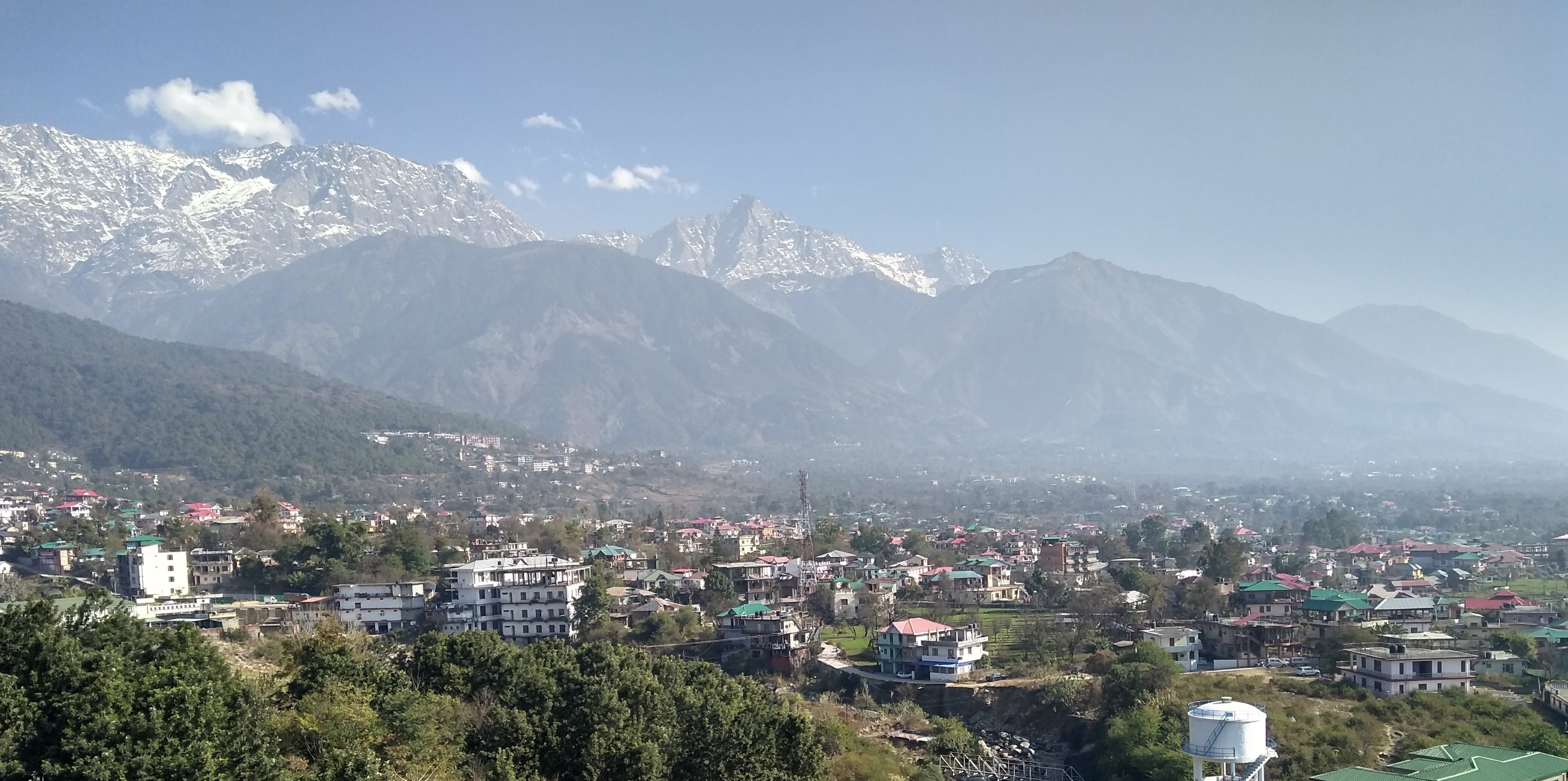Dharamshala beneath the Dhauladhar mountain range in India